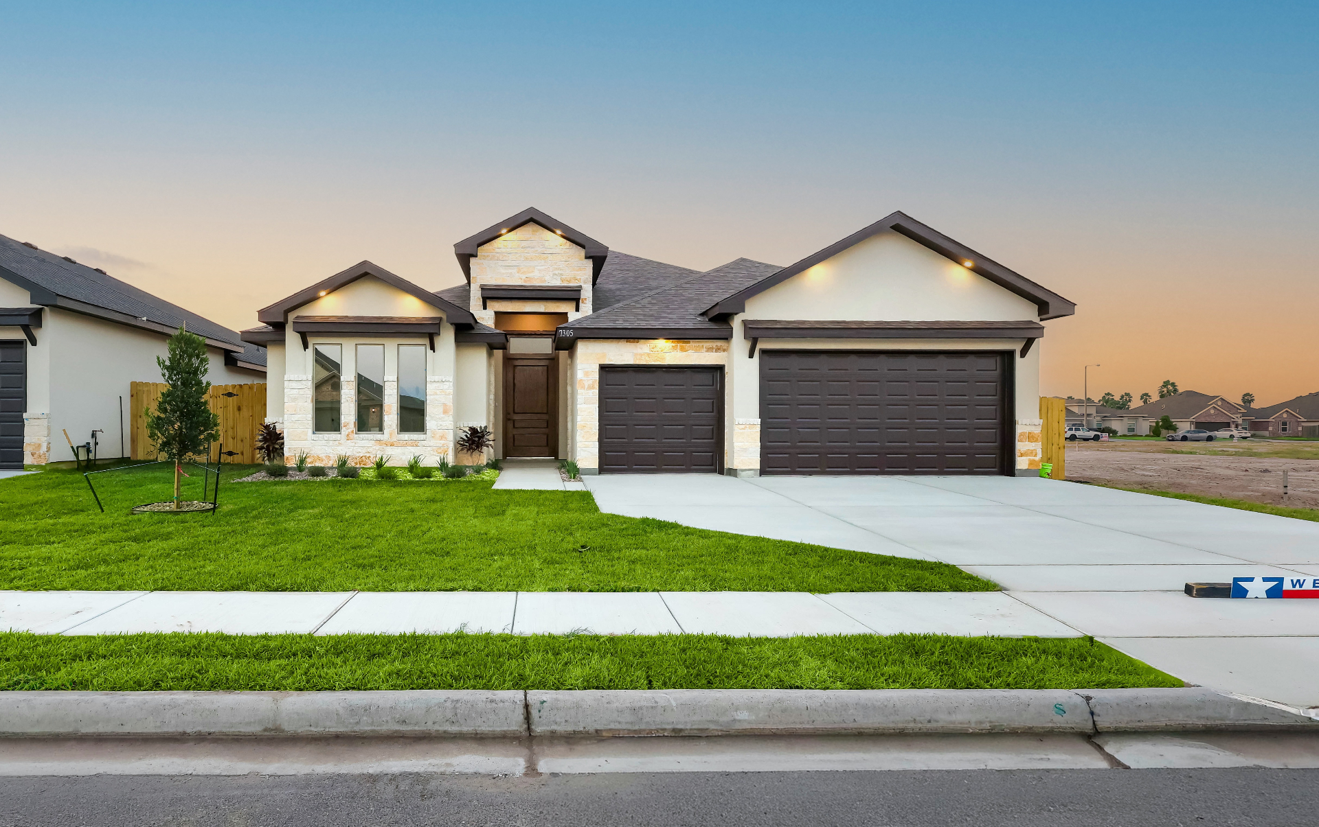 Golden-hour exterior of a new U R HOME TEXAS model home in the Rio Grande Valley