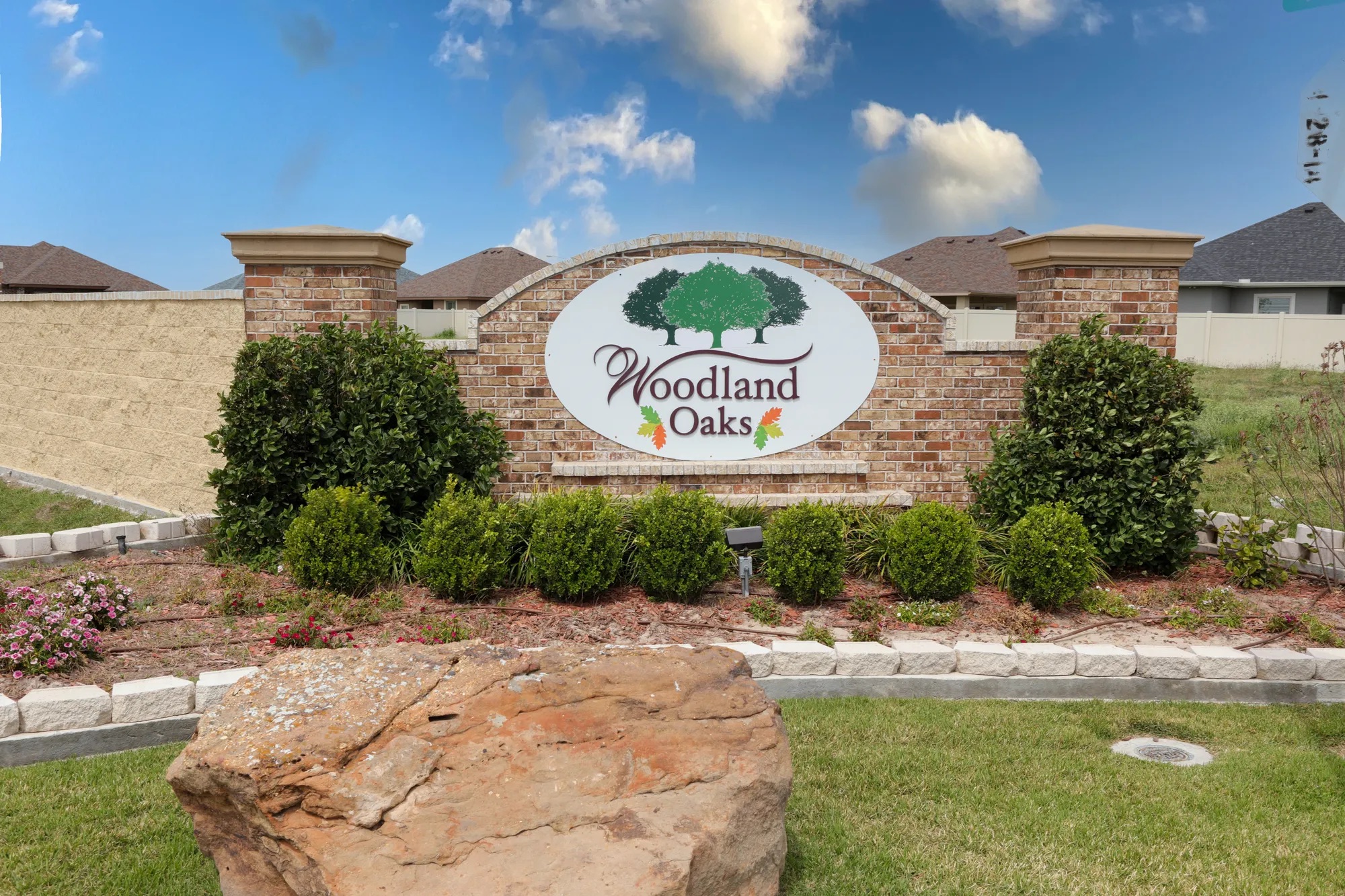 Woodland Oaks community entrance sign