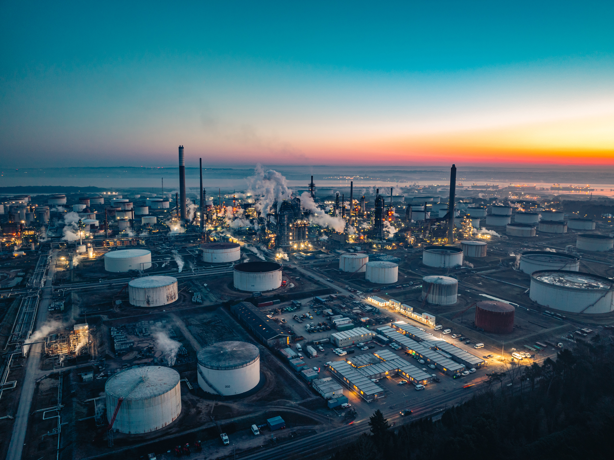 Aerial view of an LNG plant at dusk